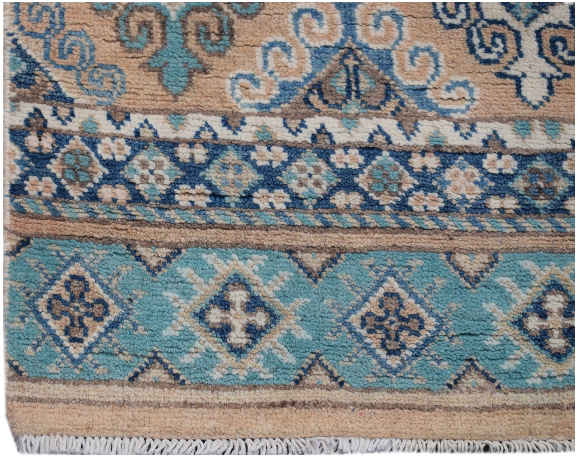 Handmade Afghan Kazakh runner rug featuring geometric patterns in shades of blue and beige.