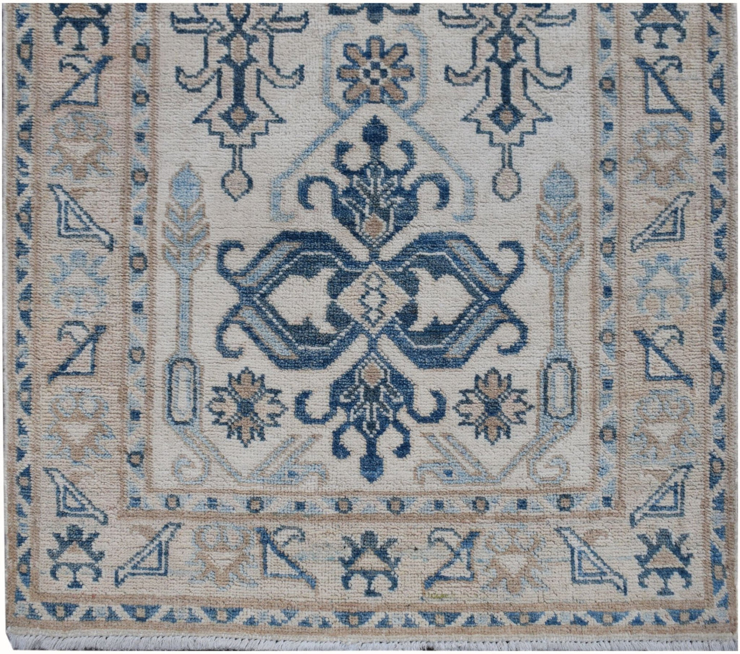 Handmade Afghan Kazakh runner featuring a traditional blue and beige geometric pattern.