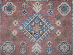 Handmade Afghan Kazakh runner featuring a pink field with traditional blue and white geometric motifs.