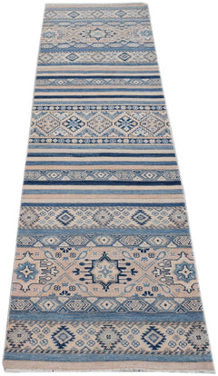 Handmade Afghan Kazakh runner rug featuring geometric patterns in shades of blue and beige.