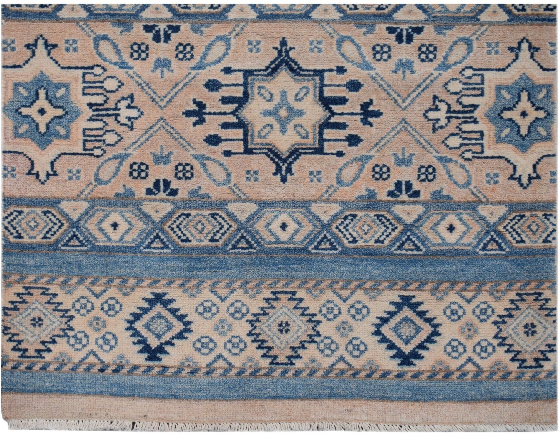 Handmade Afghan Kazakh runner rug featuring geometric patterns in shades of blue and beige.