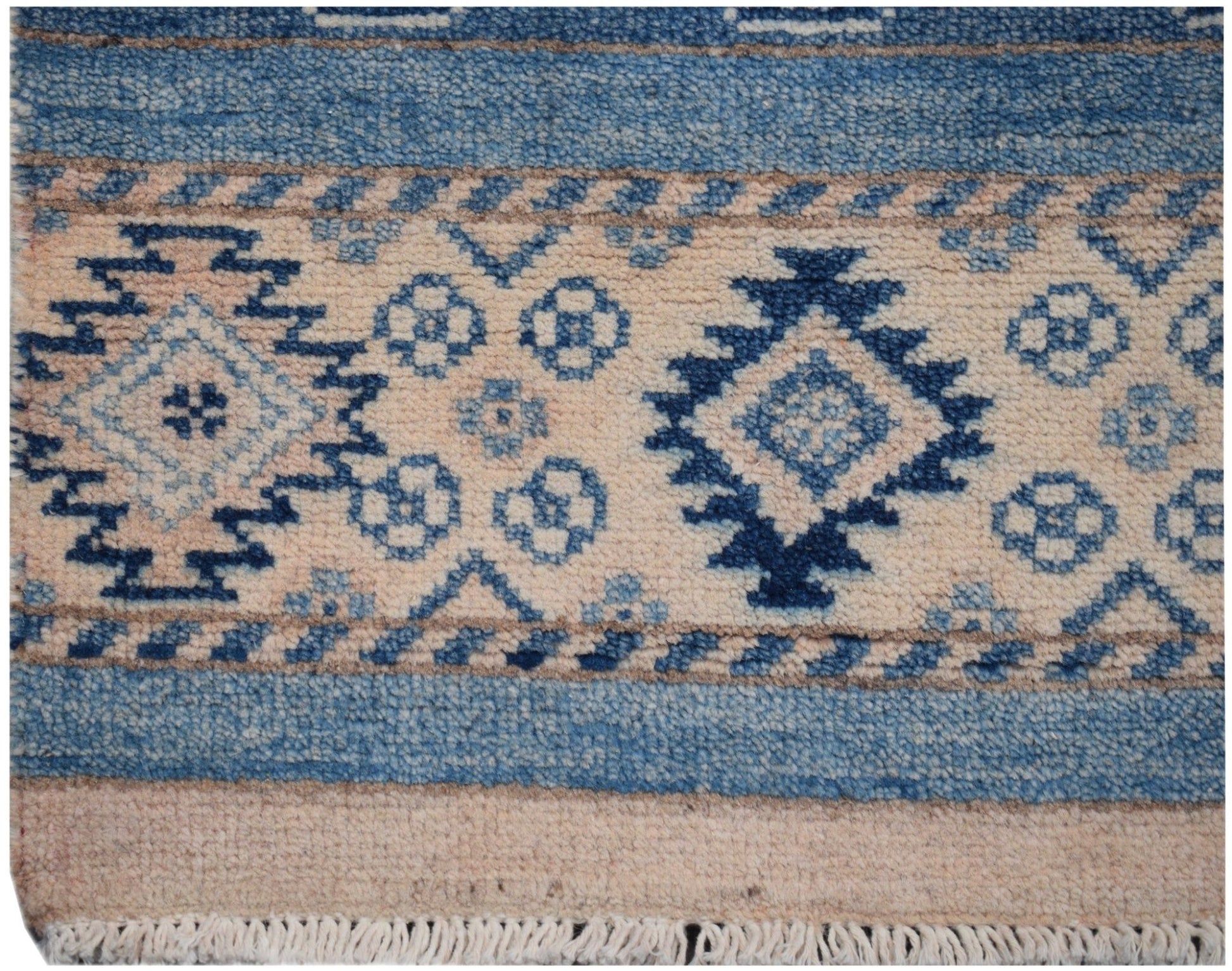Handmade Afghan Kazakh runner featuring geometric blue and beige tribal patterns.