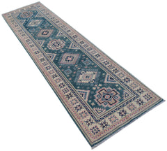 A handmade Afghan Kazakh runner rug featuring traditional geometric motifs in blue and pink.