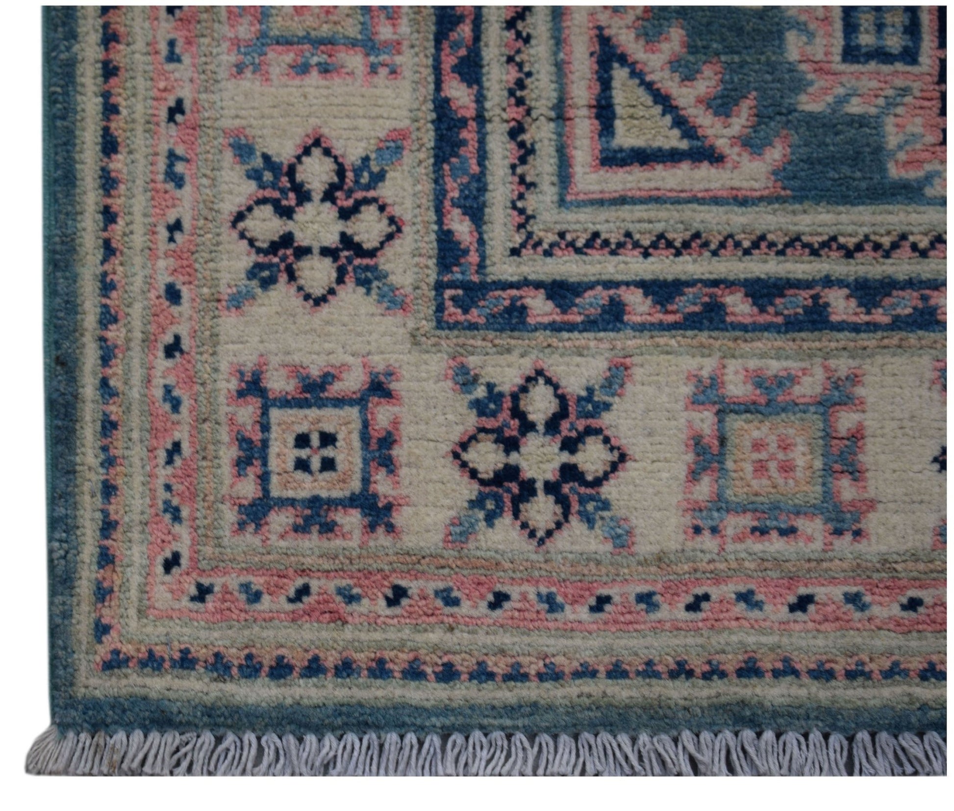 Handmade Afghan Kazakh runner featuring traditional geometric motifs in blue, pink, and cream.