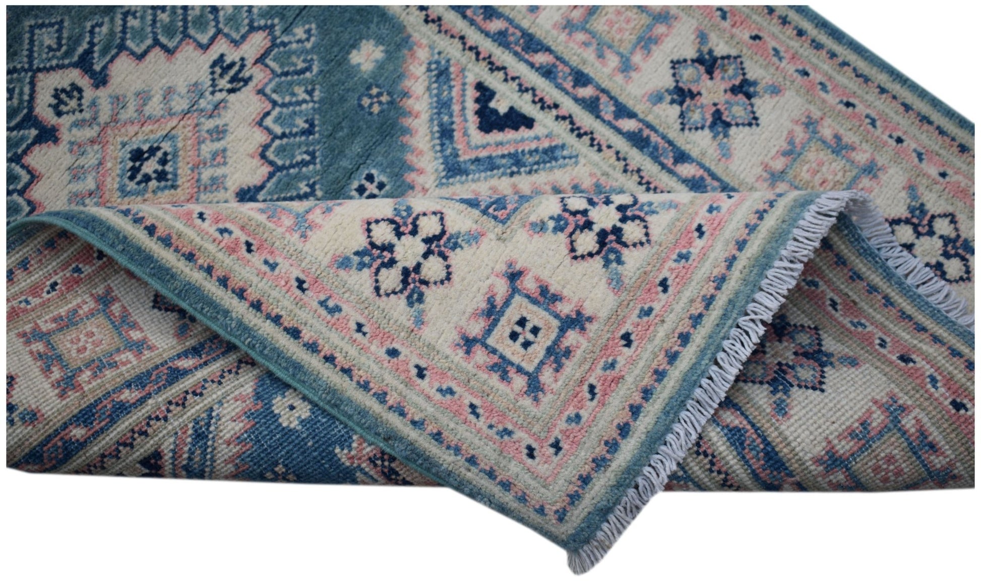 An Afghan Kazakh runner rug featuring traditional geometric motifs in blue, pink, and cream wool.