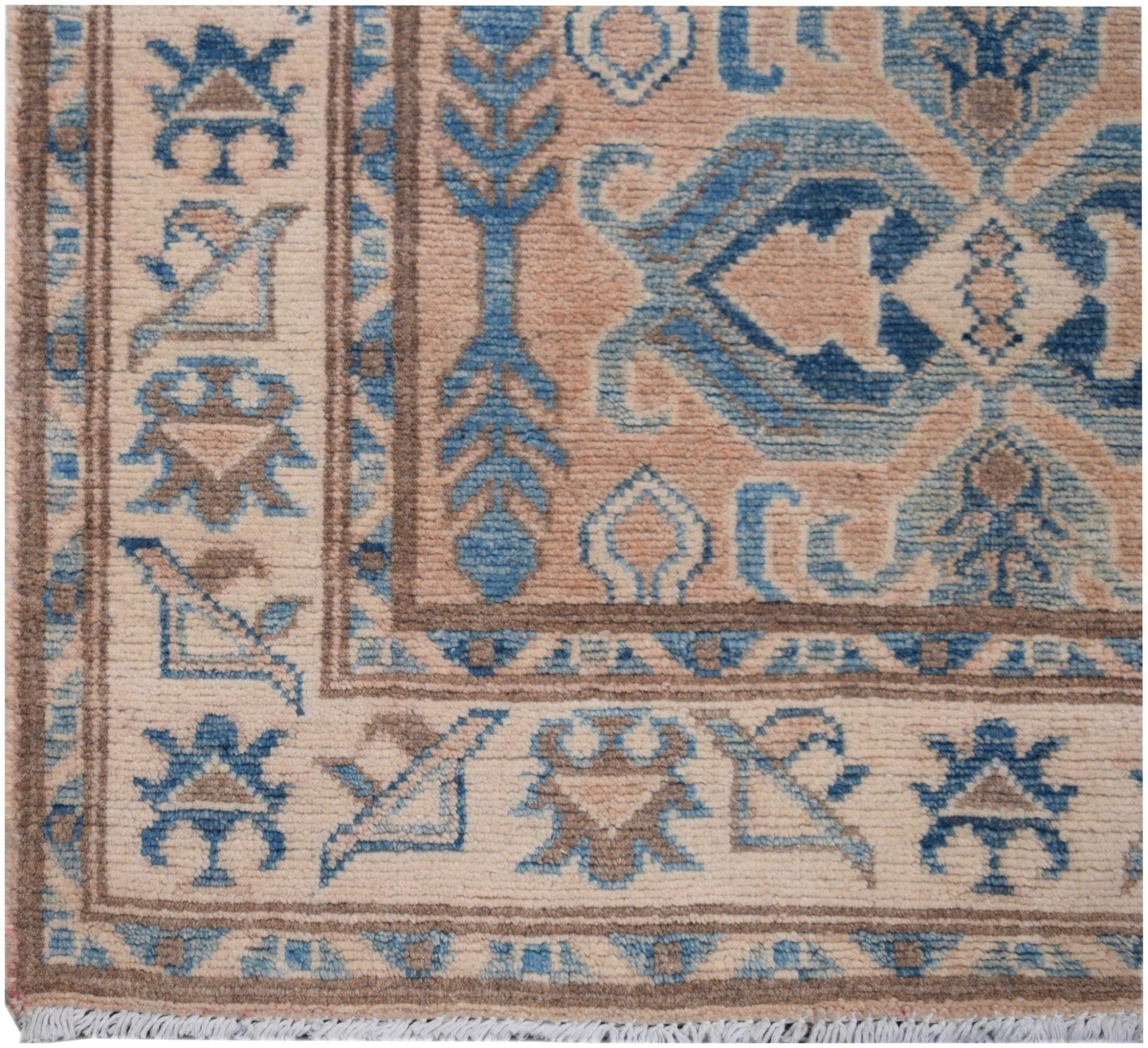 Handmade Afghan Kazakh runner featuring a geometric pattern in shades of beige and blue.