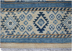 Handmade Afghan Kazakh runner rug featuring geometric blue and beige tribal patterns.