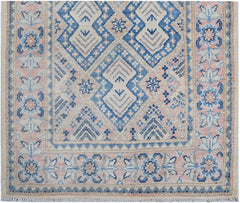 Handmade Afghan Kazakh runner featuring a geometric diamond pattern in blue, beige, and pink.