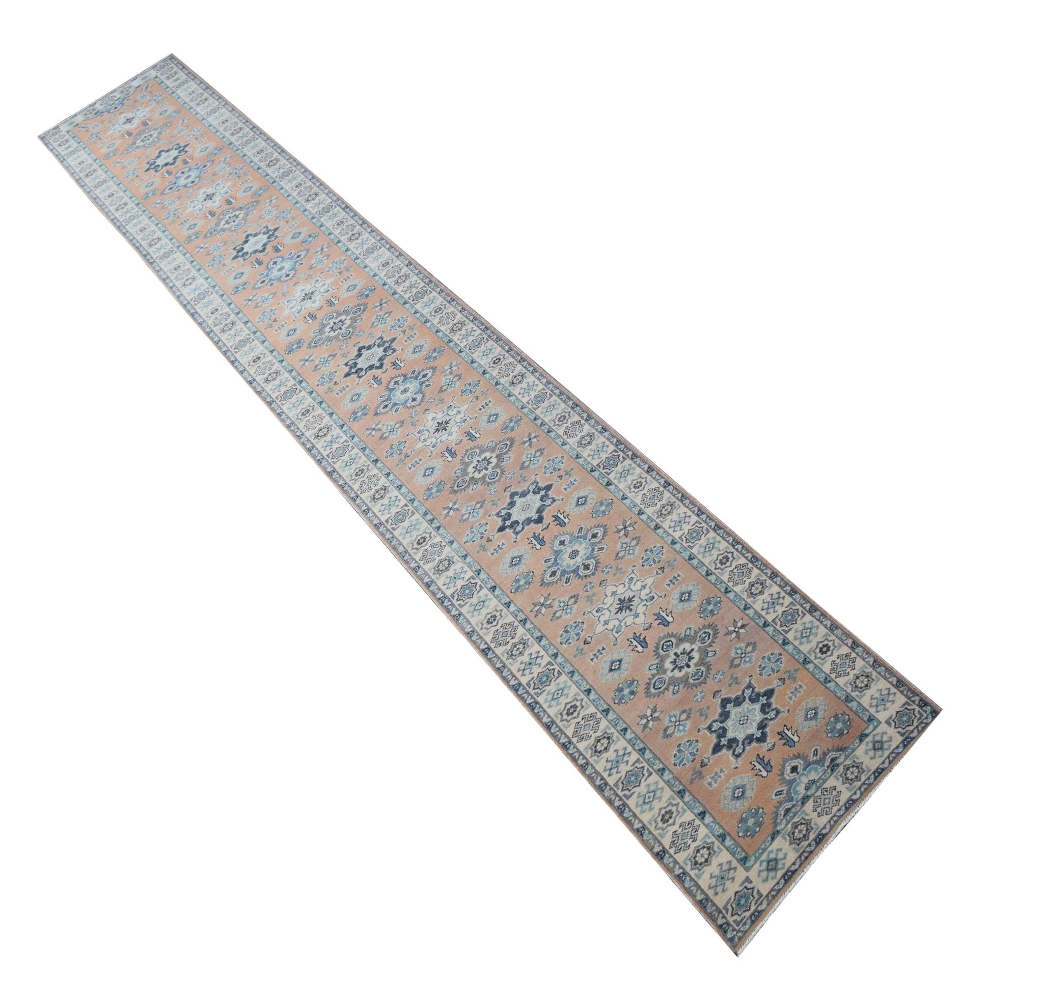 A handmade Afghan Kazakh runner rug featuring a beige field with blue and grey geometric patterns.