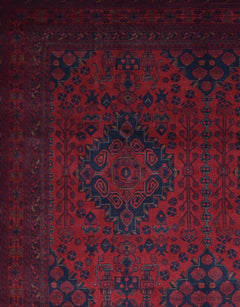 Handmade Afghan Khal Mohammadi wool rug featuring deep red tones and geometric blue patterns.
