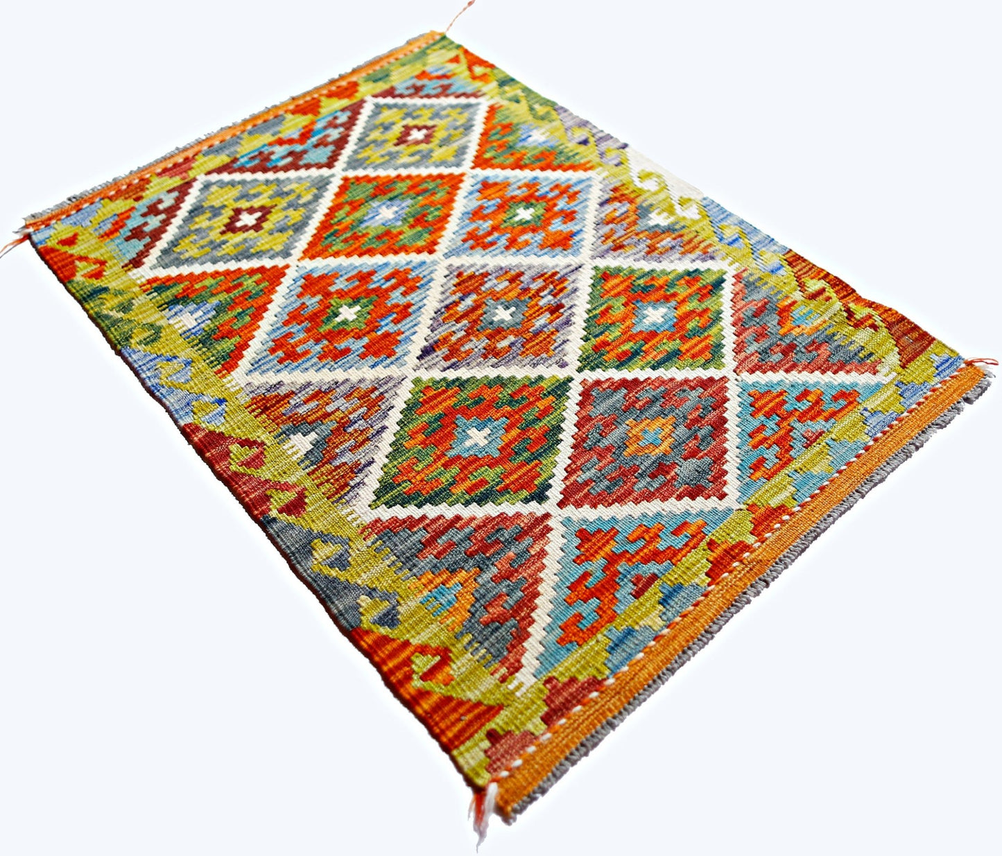 Handwoven Afghan Maimana kilim rug featuring a colorful geometric diamond pattern in wool.