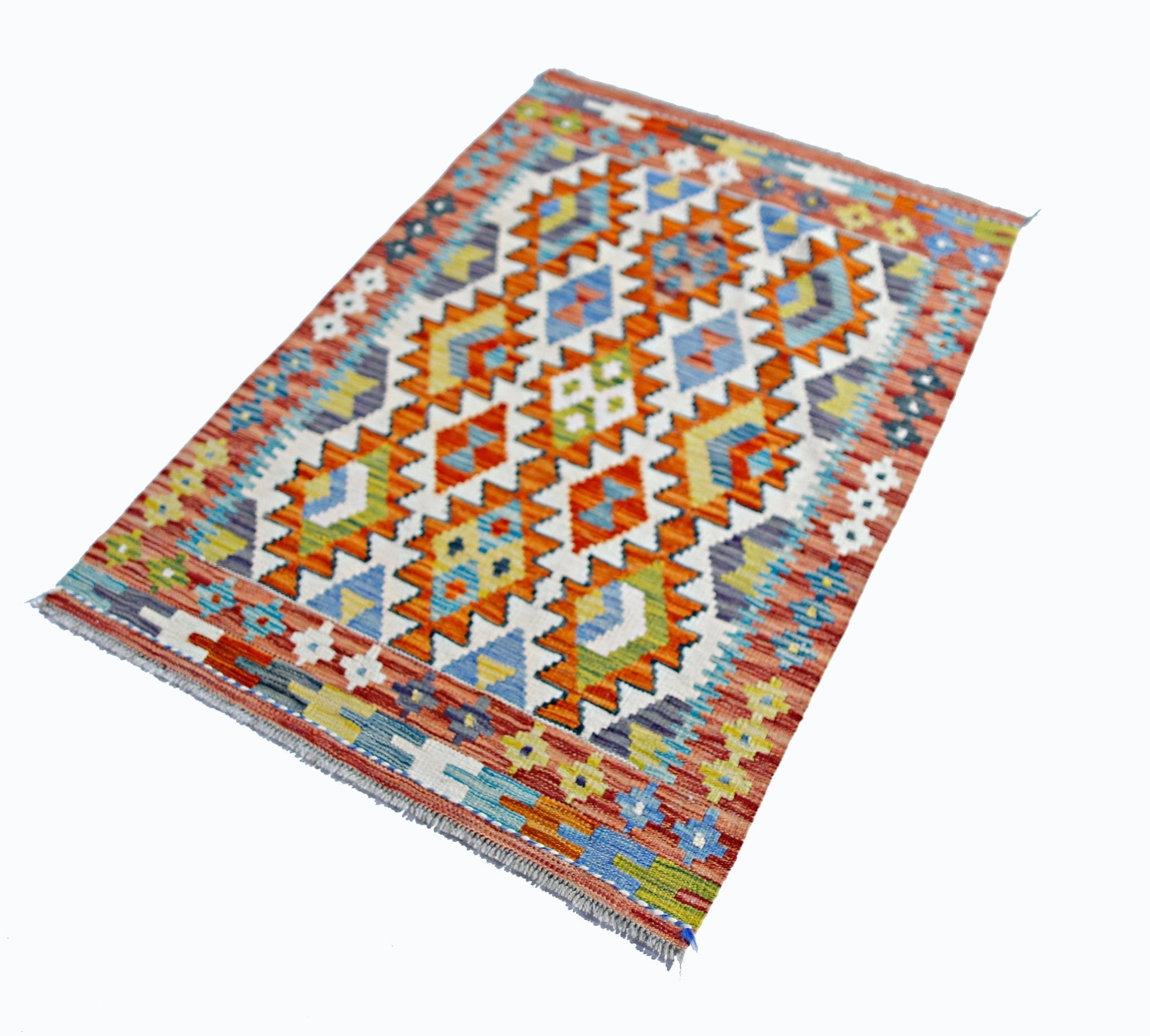Handwoven Afghan Maimana kilim rug featuring a vibrant geometric pattern in wool.