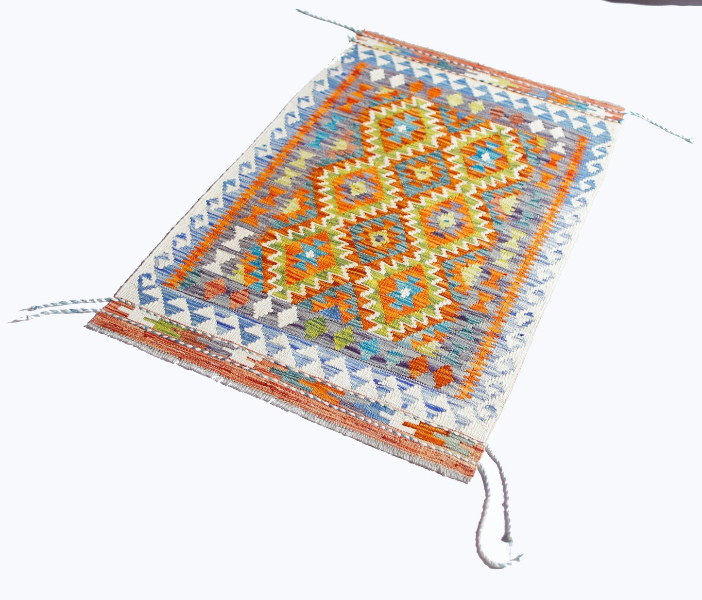 Handwoven Afghan Maimana kilim rug featuring a vibrant geometric pattern in wool.