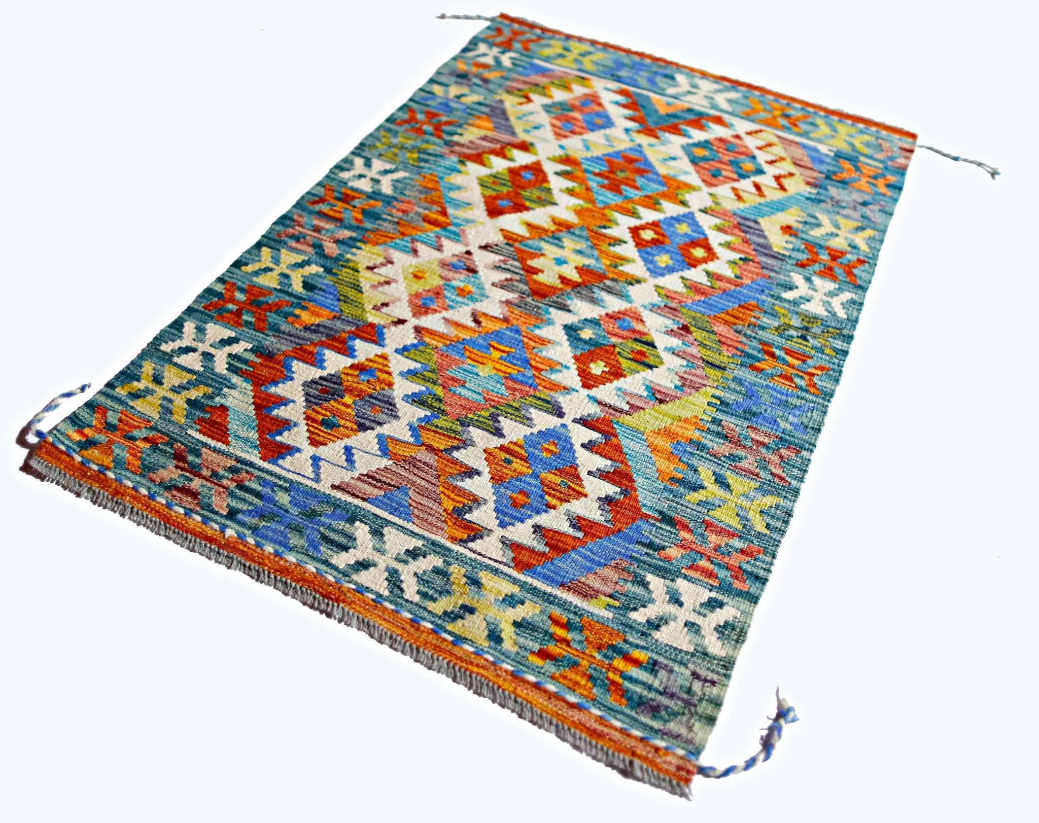 A rectangular Afghan Maimana kilim featuring a vibrant geometric pattern in wool.