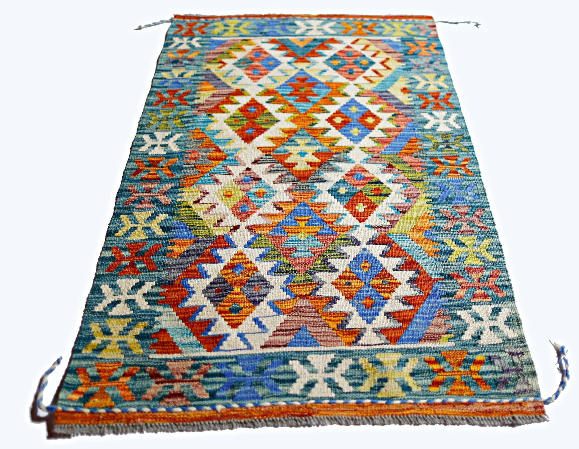 A rectangular Afghan Maimana kilim rug featuring a vibrant, multi-colored geometric diamond pattern.