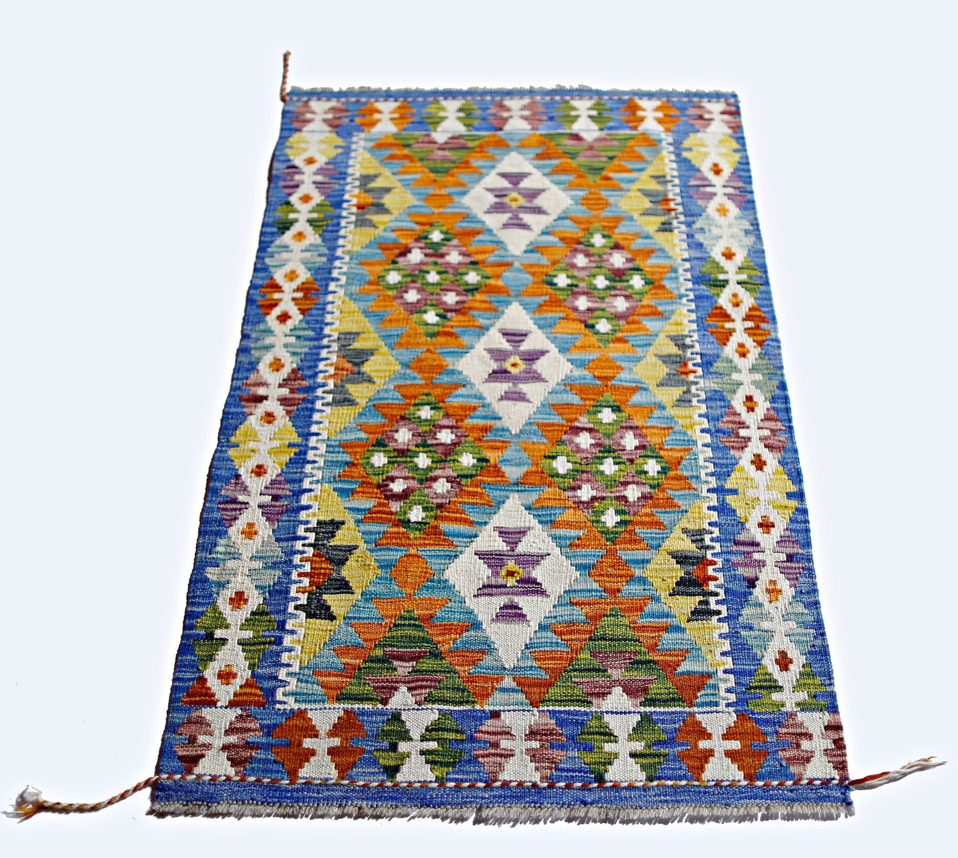 Handwoven Afghan Maimana kilim featuring a vibrant geometric pattern in wool.