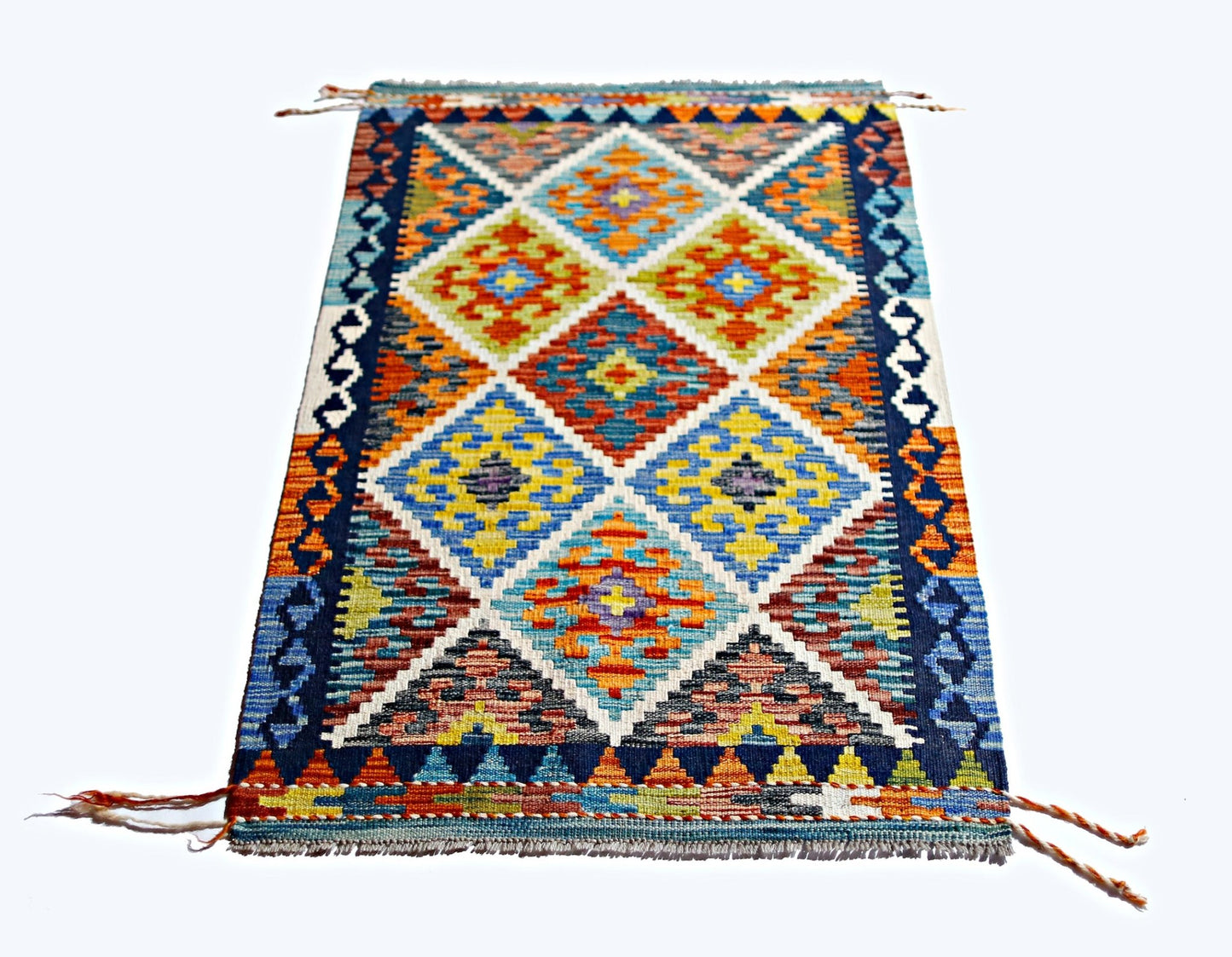 Handwoven Afghan Maimana kilim rug featuring a vibrant geometric diamond pattern in wool.