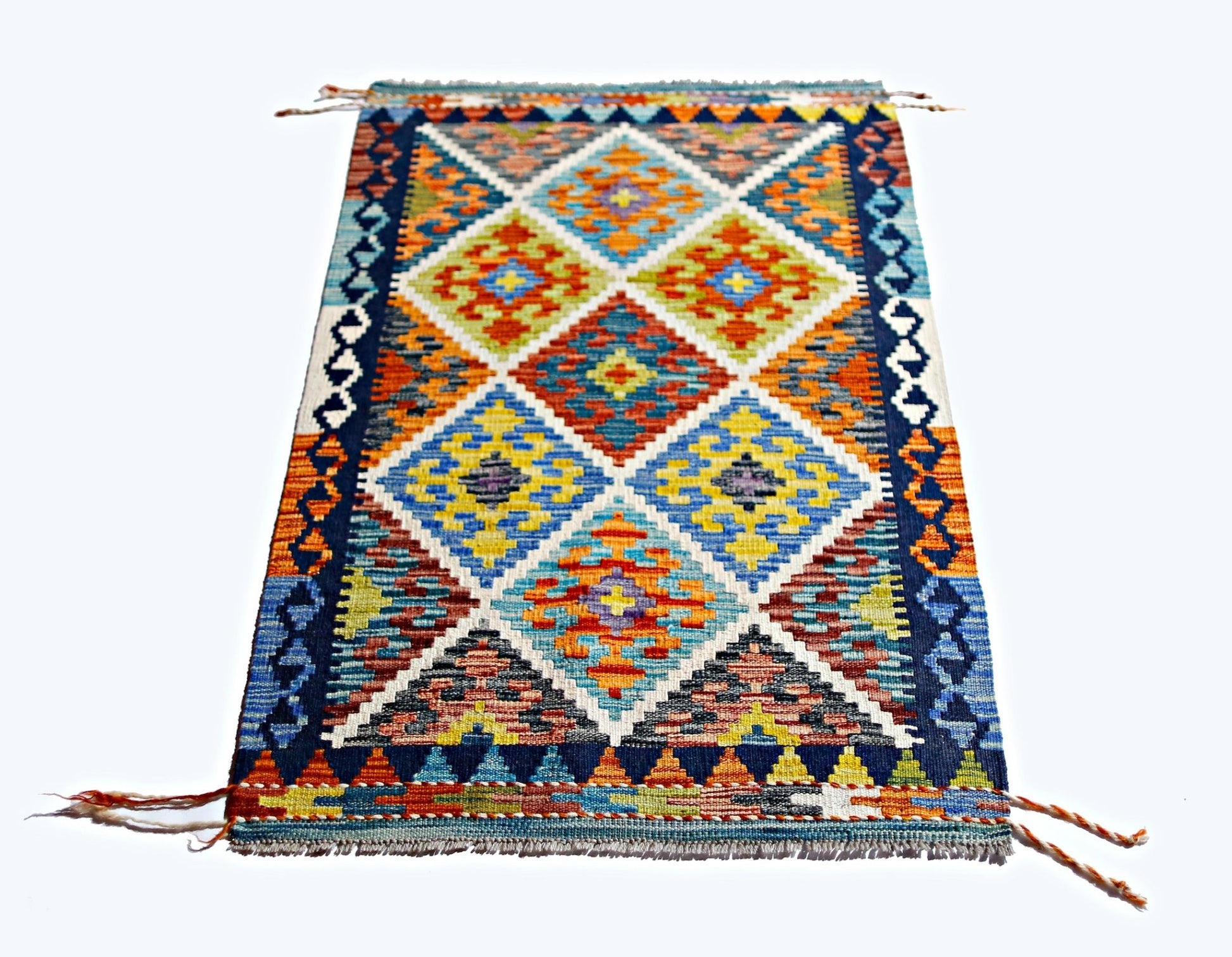 Handwoven Afghan Maimana kilim rug featuring a vibrant geometric diamond pattern in wool.