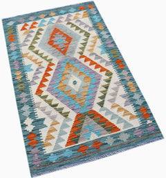 Handwoven Afghan Maimana kilim rug featuring a geometric diamond pattern in blue, orange, and tan.