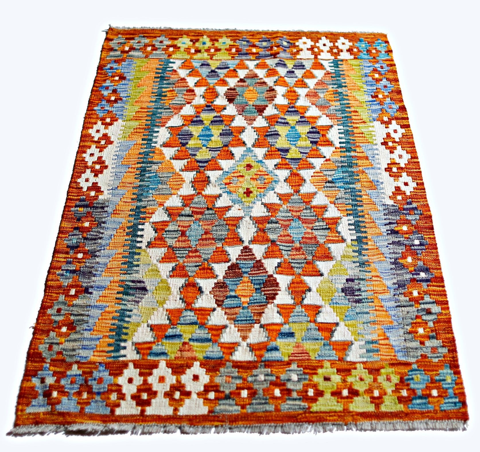 Handwoven Afghan Maimana kilim rug featuring a vibrant geometric diamond pattern in wool.