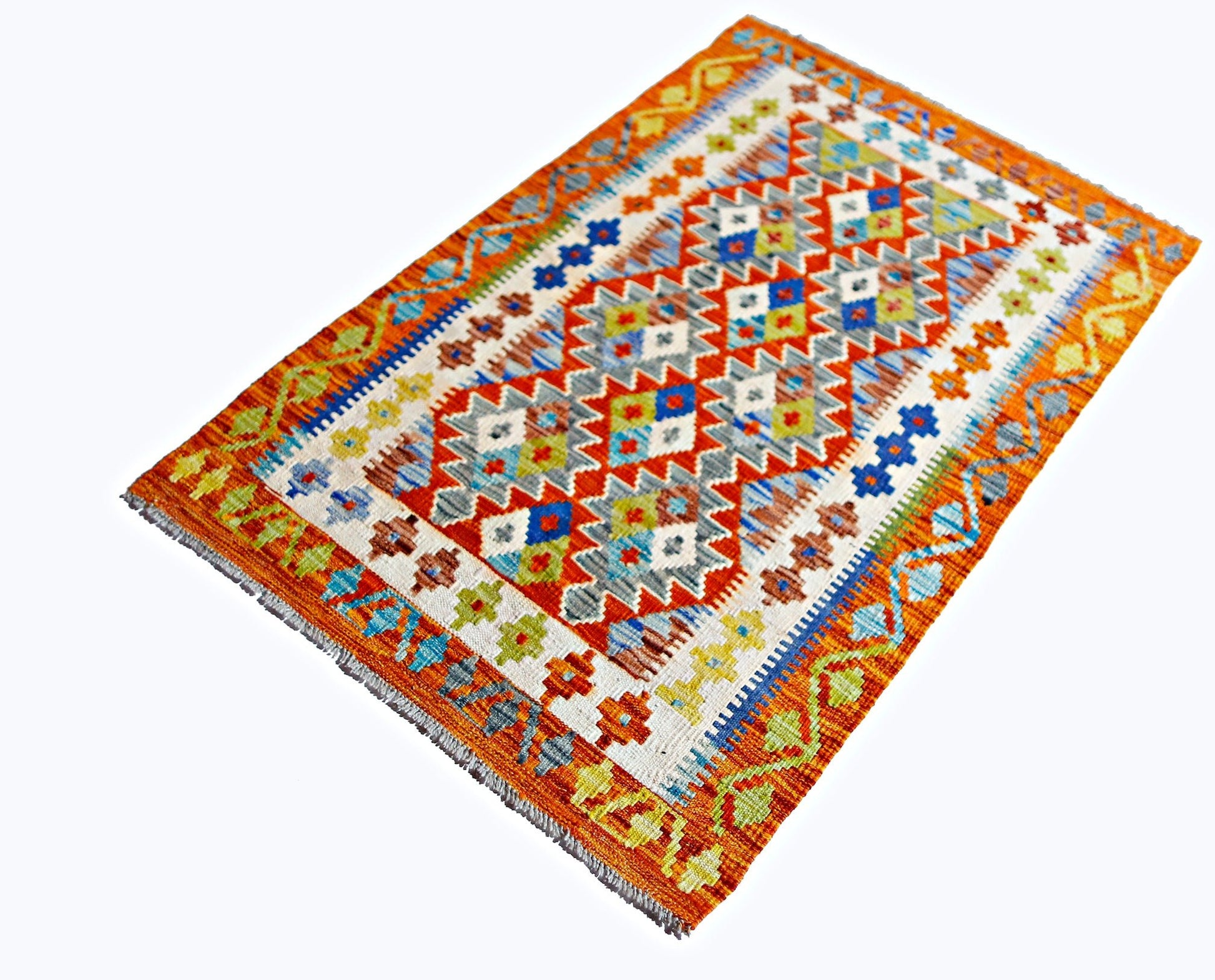 A rectangular Afghan Maimana kilim featuring a vibrant geometric pattern in wool.