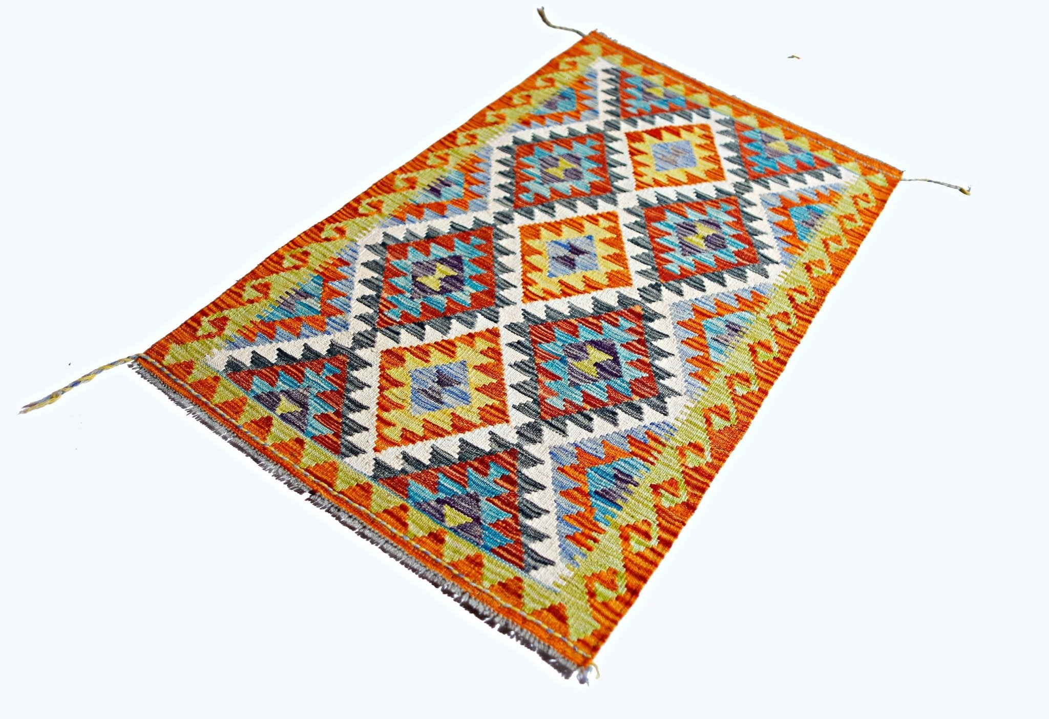 Handwoven Afghan Maimana kilim rug featuring a vibrant geometric diamond pattern in wool.