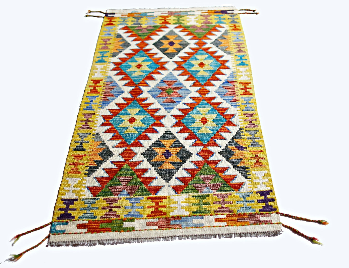 Handwoven Afghan Maimana kilim rug featuring a vibrant geometric pattern in wool.