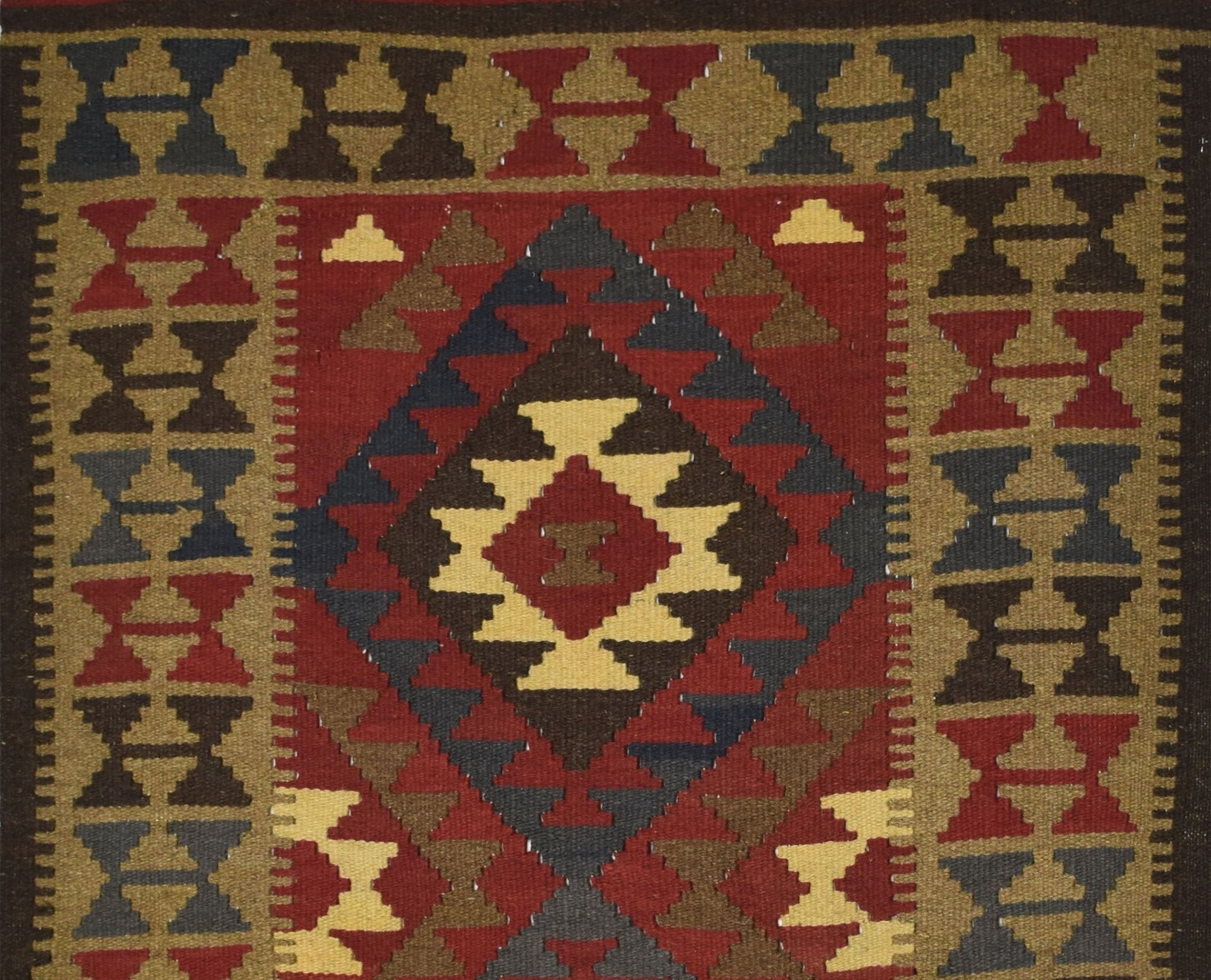 Handmade Afghan Maimana kilim rug featuring a geometric diamond pattern in red, brown, and tan.