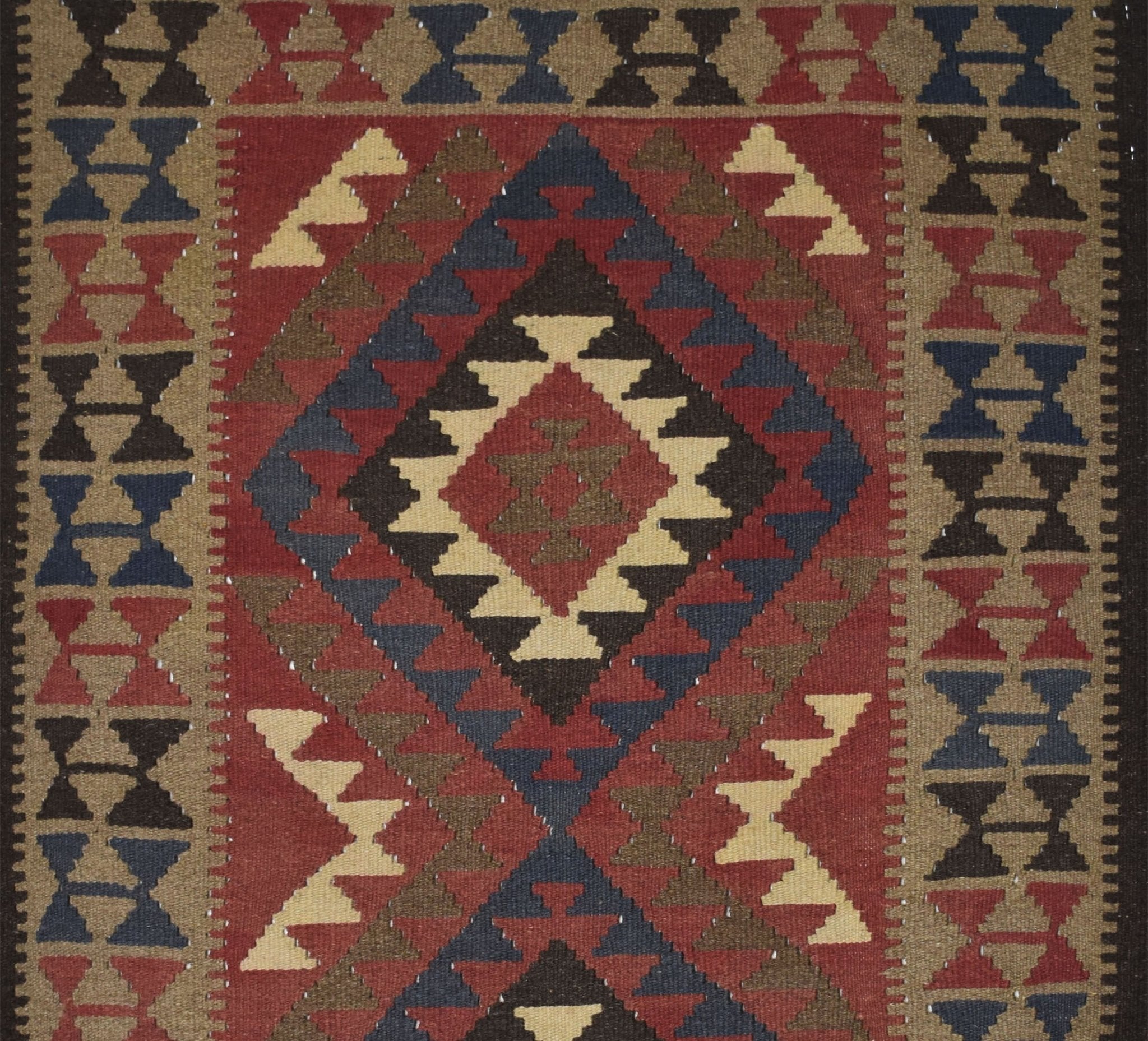 Handmade Afghan Maimana kilim rug featuring a geometric diamond pattern in red, blue, and tan.