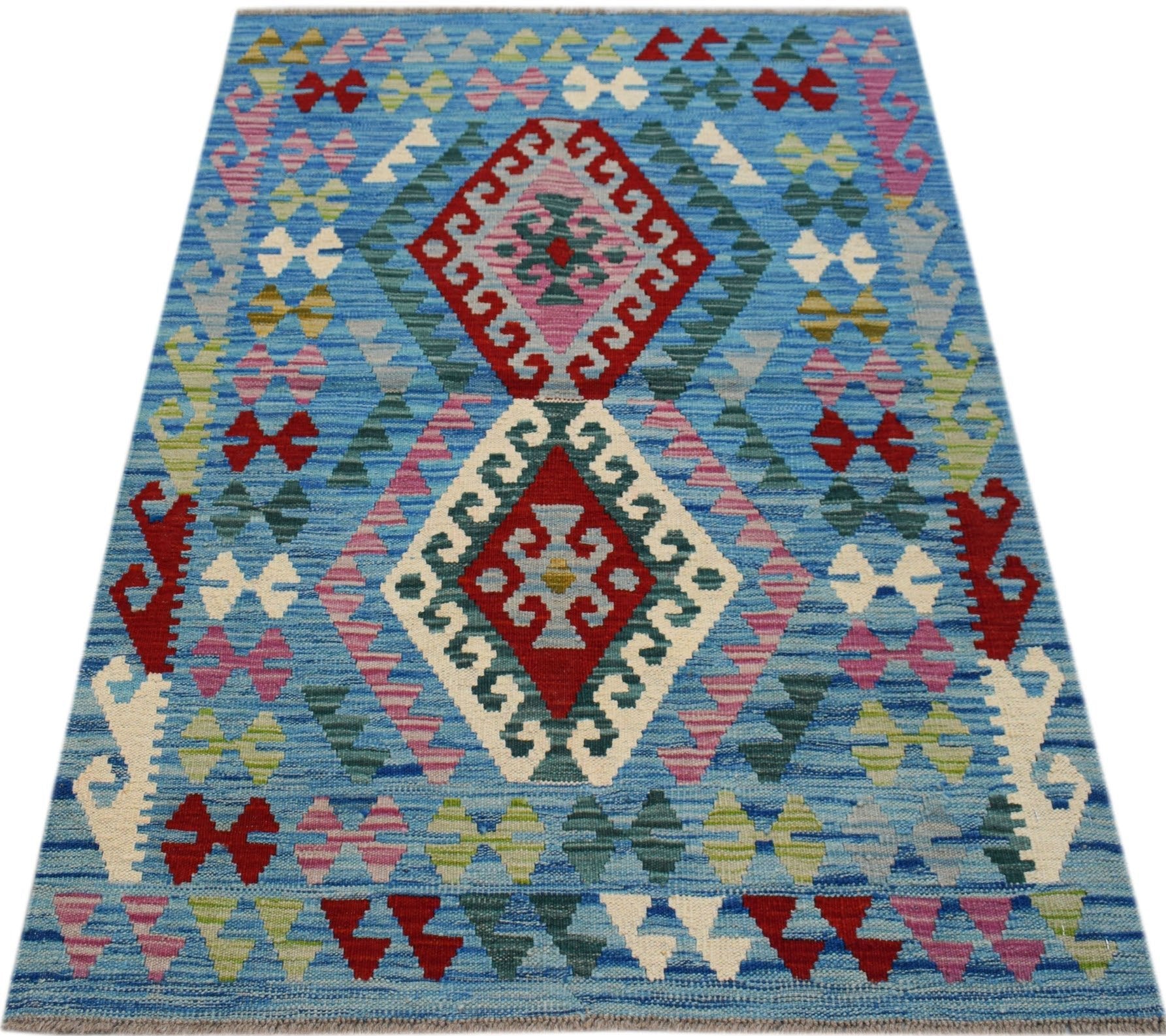 Handwoven Afghan Maimana kilim rug featuring a blue background with geometric diamond patterns.
