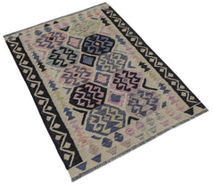 Afghan Maimana Kilim with geometric patterns in blue, pink, and beige.