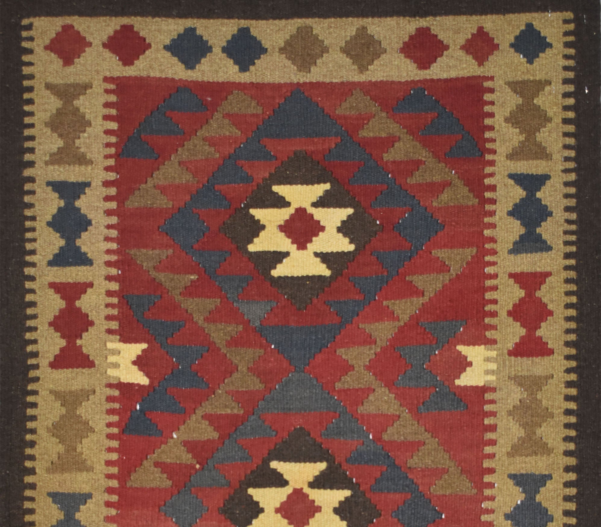 Handmade Afghan Maimana kilim rug featuring a geometric diamond pattern in red, brown, and tan.