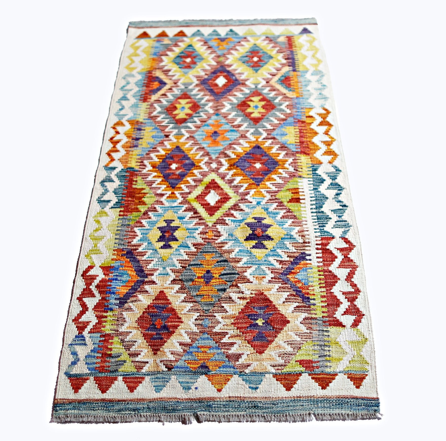 A rectangular, handwoven Afghan Maimana kilim rug featuring a vibrant, multicolored geometric pattern.
