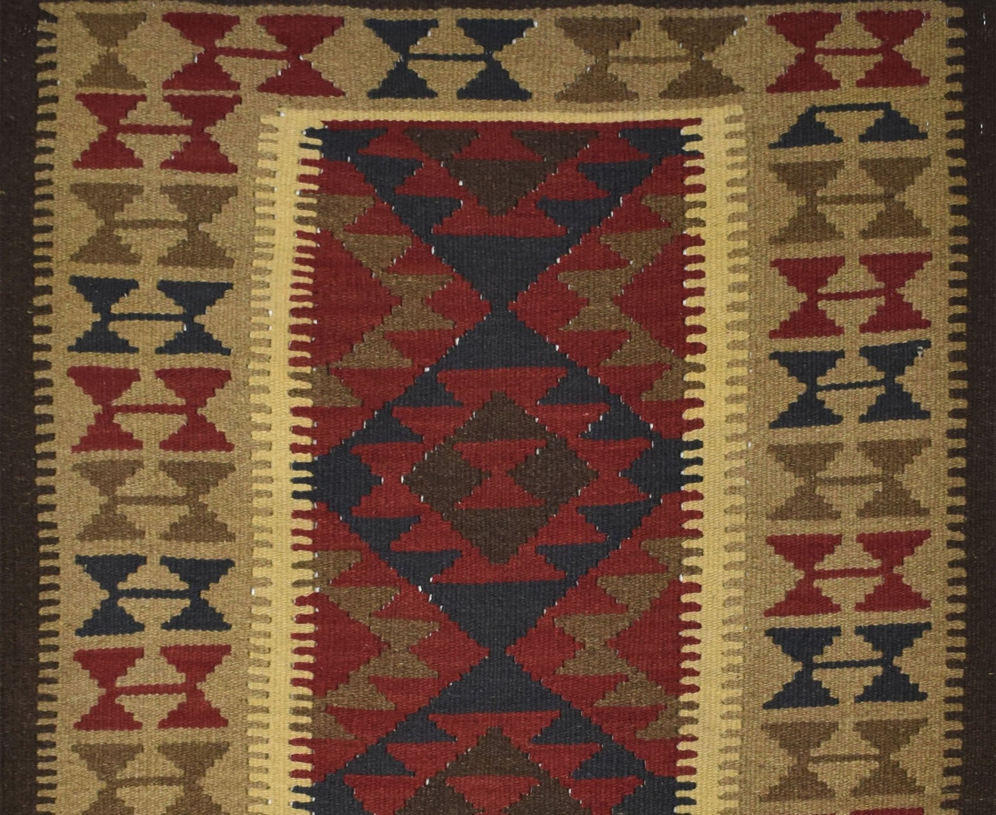 Handmade Afghan Maimana kilim rug featuring a geometric pattern in red, brown, and dark blue.