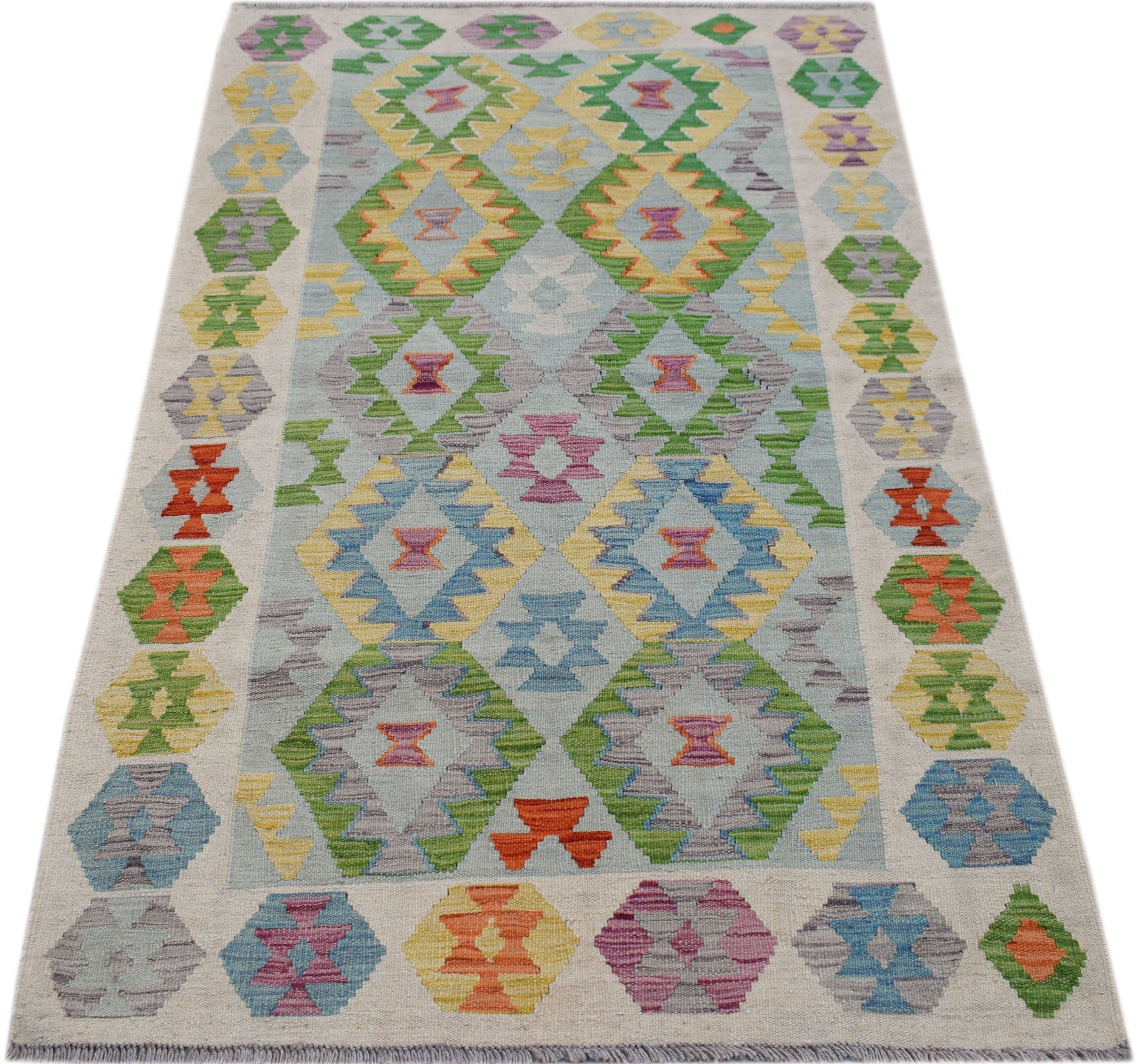 Handwoven Afghan Maimana kilim rug featuring a colorful geometric diamond pattern on a light base.