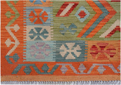 Handwoven Afghan Maimana kilim featuring a geometric pattern in orange, green, and blue tones.
