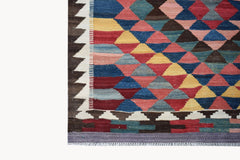 Handwoven Afghan Maimana kilim featuring a colorful geometric diamond pattern and fringed edges.