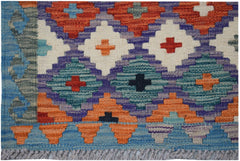 Handwoven Afghan Maimana kilim rug featuring a colorful geometric diamond pattern in wool.