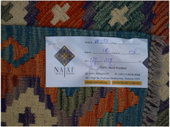 A handwoven Afghan Maimana kilim rug featuring a colorful geometric pattern and flatweave texture.