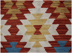 Handwoven Afghan Maimana kilim featuring a geometric pattern in red, yellow, blue, and white.