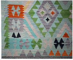 Handwoven Afghan Maimana kilim rug featuring a geometric pattern in vibrant wool colors.