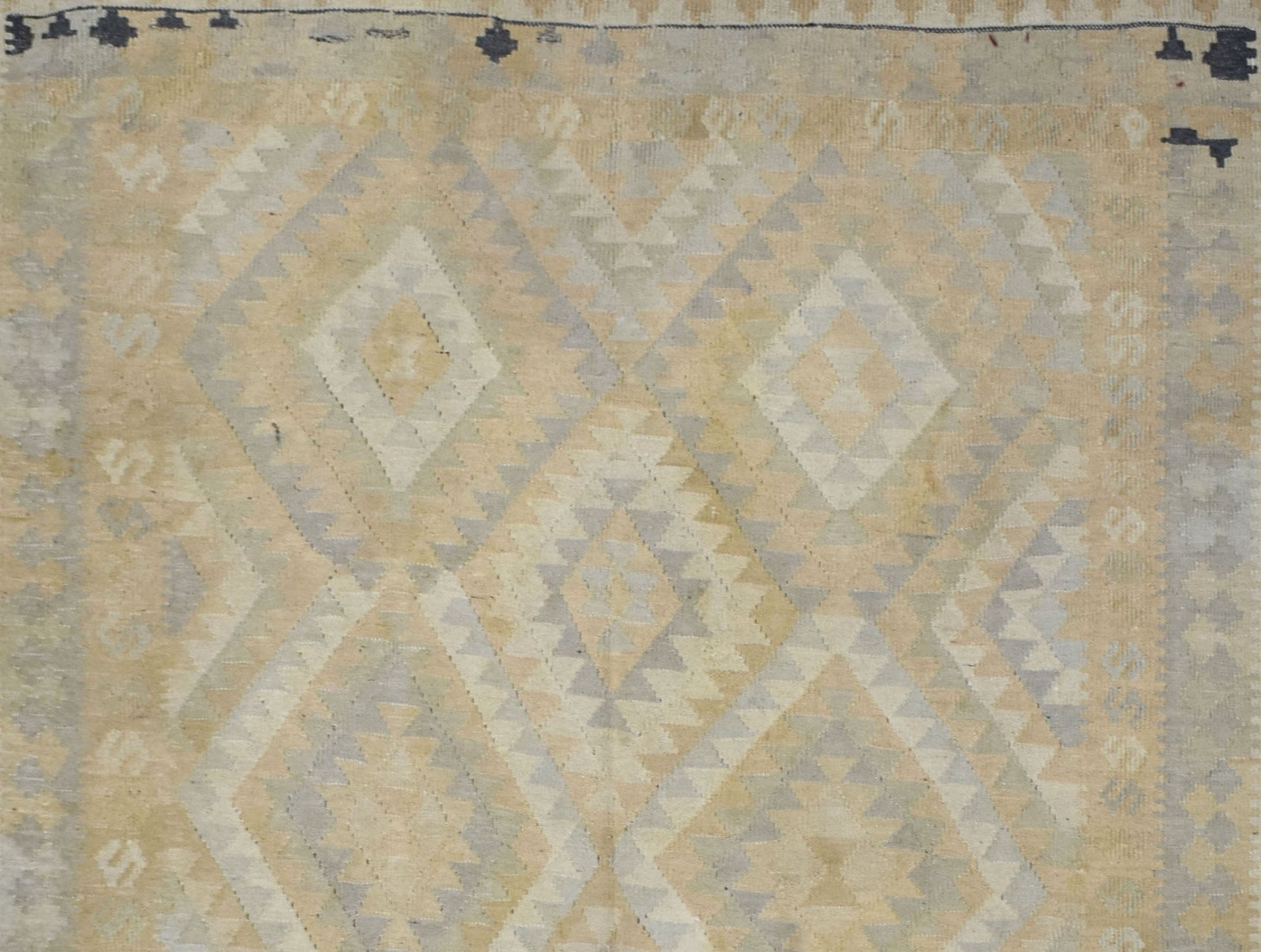 Handmade Afghan Maimana kilim rug featuring a geometric diamond pattern in neutral tones.