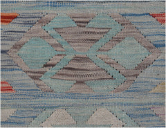 A handwoven Afghan Maimana kilim featuring a geometric pattern in blue, grey, and orange tones.
