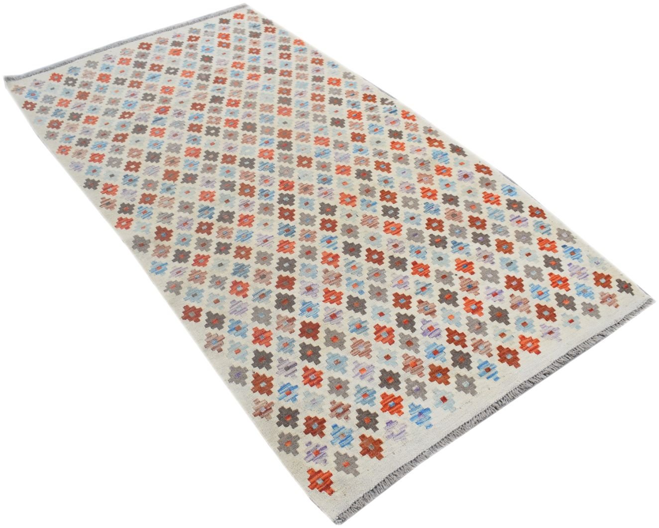 A handmade Afghan Maimana kilim rug featuring a repeating geometric pattern in orange, blue, and grey.