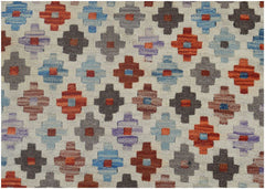 Handmade Afghan Maimana kilim rug featuring a repeating geometric pattern in vibrant colors.