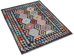 Afghan Maimana Kilim with geometric patterns in multiple colors on a black background.