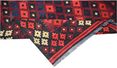 Handwoven Afghan Maimana kilim featuring a geometric pattern in red, blue, and cream wool.