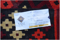 A flatwoven Afghan Maimana Kilim featuring a geometric pattern in red, black, and beige wool.