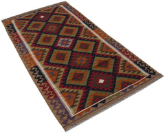 Handwoven Afghan Maimana kilim rug featuring a geometric diamond pattern in earthy tones.
