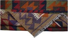 A handwoven Afghan Maimana kilim rug featuring a geometric pattern in rich, multicolored wool.
